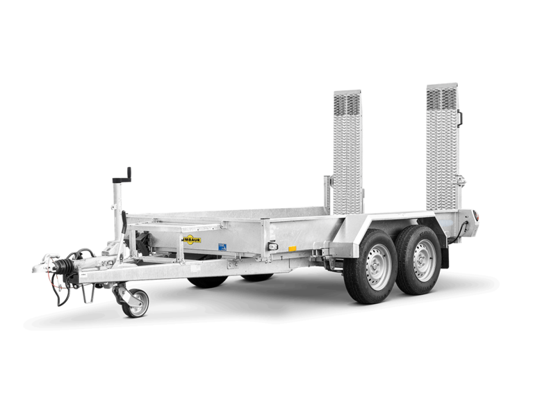 HS Basis, Ein Humbaur Baumaschienen Transporter mit Auffahrbohlen und Optional verbaubarer Baggerstielablage, vorne links | © Humbaur GmbH